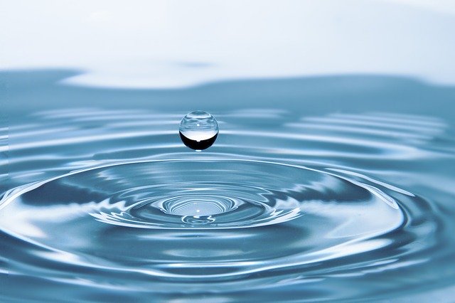 Wassertropfen fällt ins Wasser Symbol